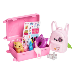 Pack Barbie's suitcase with travel accessories.