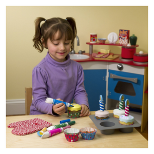 Child playing with Bake & Decorate Cupcake Set