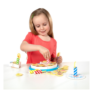 Child playing with Birthday Cake Play Set