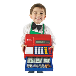 Child holding cash register