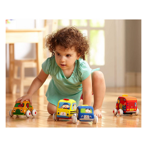 child playing with vehicles