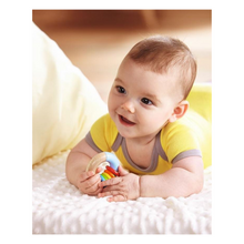 Load image into Gallery viewer, Baby holding clutching toy
