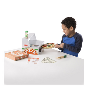 Child playing with Pizza Counter