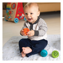 Load image into Gallery viewer, Baby playing with rollers